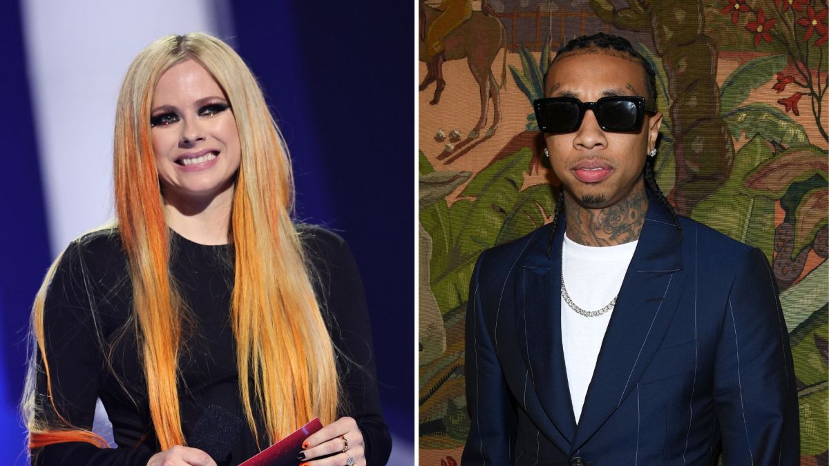 Avril Lavigne y Tyga protagonizan tremendo beso en pleno desfile de modas de París | Fotos: Getty Images