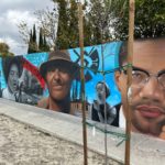 Un mural contra el odio con símbolos de diferentes culturas fue develado en el barrio de Watts. (Araceli Martínez/La Opinión)