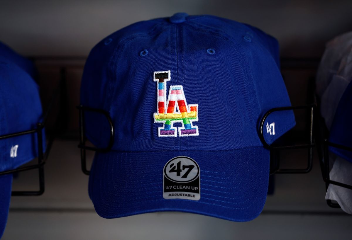 LOS ANGELES, CALIFORNIA - JUNE 03:  A Los Angeles Dodgers hat on LGBTQ+ Pride Night at Dodger Stadium on June 03, 2022 in Los Angeles, California. (Photo by Ronald Martinez/Getty Images)